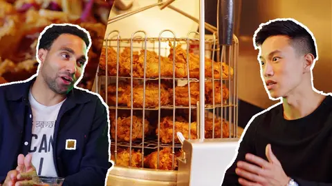 Wilson K Lee beside a rack of fried chicken at Juke